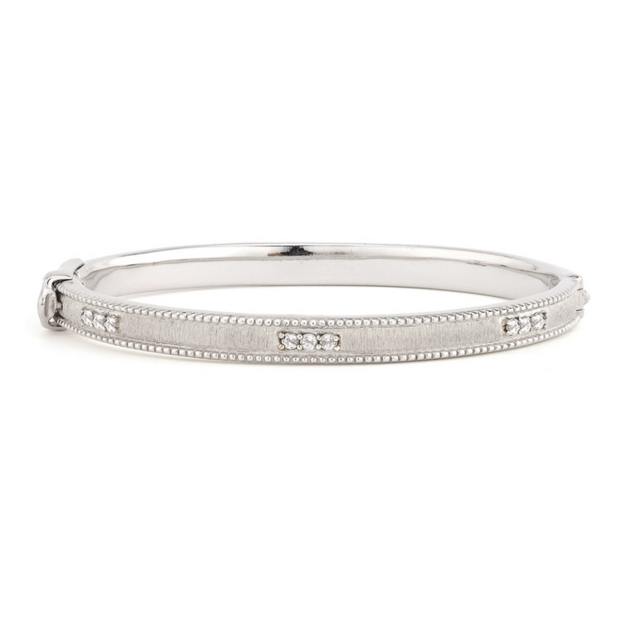 From the JudeFrances Silver Collection, the JudeFrances Silver Simple Lisse Bangle features round faceted white topaz pave set in sterling silver with the signature brushed JFJ finish and beaded edge.