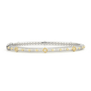 From the Mixed Metal Collection, the Mixed Metal Alternating Kite Bangle features diamond and 18K gold kites and 18K gold nail head accents set on a sterling silver bangle with the signature brushed JFJ finish.
