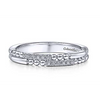 One of the most unique band designs in the Gabriel & Co. collection, this 14K white gold wedding band features beading and diamonds in an intriguing pattern. Stack this band in with your existing wedding bands! 