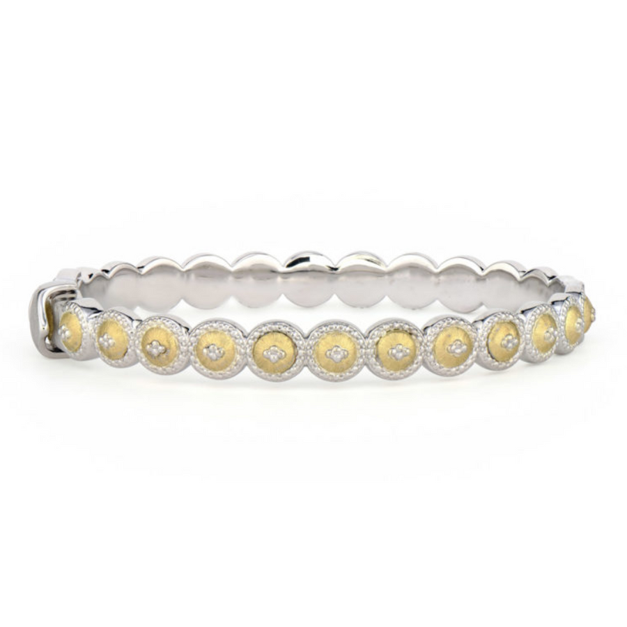 From the Mixed Metal Collection, the Mixed Metal Beaded Quad Circle Bangle features silver beaded quad set in yellow gold on a sterling silver bangle.