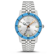 Inspired by the vivid hues of the ocean deep, this exclusive Super Sea Wolf 53 Compression channels the beauty of the open water through bold blue tones on the bezel and colorful accents on the dial. Complemented by a five-link bracelet, the classic brushed stainless steel case holds Zodiac's iconic Swiss-made STP 3-13 automatic movement.Case size: 40 mm x 49 mmCase thickness: 13 mmLug width: 20 mmMovement: AutomaticOrigin: Swiss MadePackaging: Zodiac Black BoxWarranty: 2 Year InternationalWater