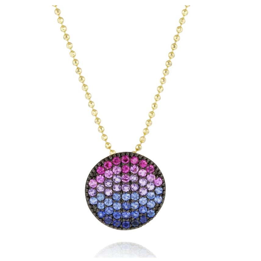 Add some color to your collection with this playful colored gemstone necklace featuring 0.95ctw amethyst, blue sapphire and pink sapphire in a yellow gold pendant. 