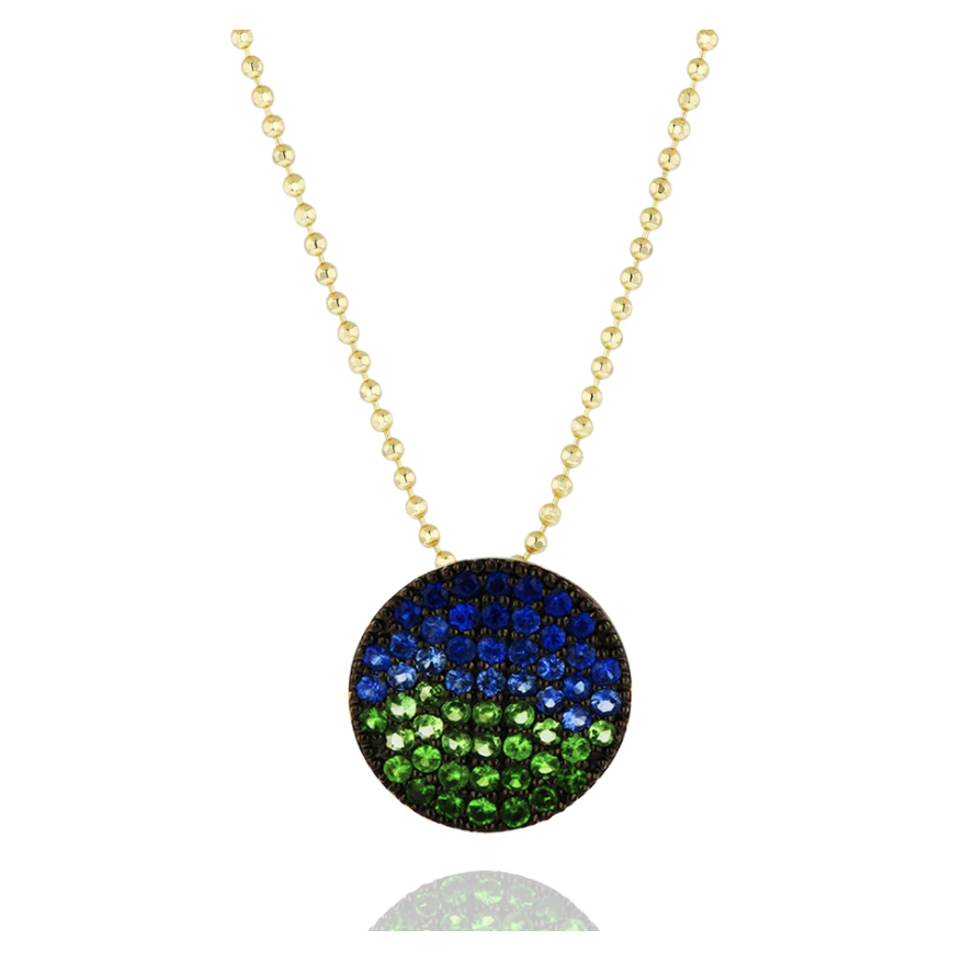 Add some color to your jewelry wardrobe with this playful 1.04ctw blue sapphire and savorites medium infinity necklace from Phillips House. 