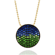 Add some color to your jewelry wardrobe with this playful 1.68ctw blue sapphire and savorites large infinity necklace from Phillips House. 