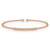 Crisp pave diamonds take center stage in this pink gold bangle.