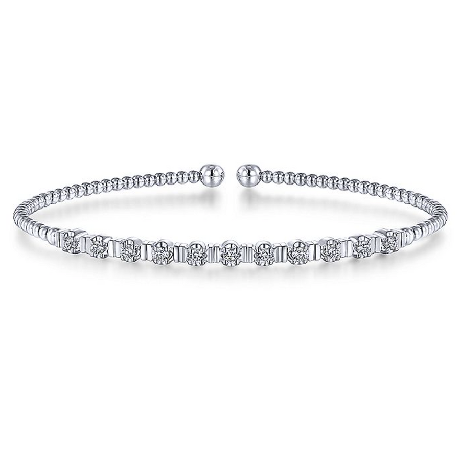 As 11 round dazzling diamonds encircle this gorgeously beaded 14K White Gold Bangle, all eyes will be on you. Available in Rose, Yellow, and White Gold at Gabriel & Co. 