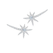 These starburst earrings are stunning! The long tail of the starburst travels up the wearers ear creating an ear cuff look. These earrings have also been spotted on Taylor Swift! There are 0.45 carat total weight of I-J color white diamonds set in 18K white gold. 