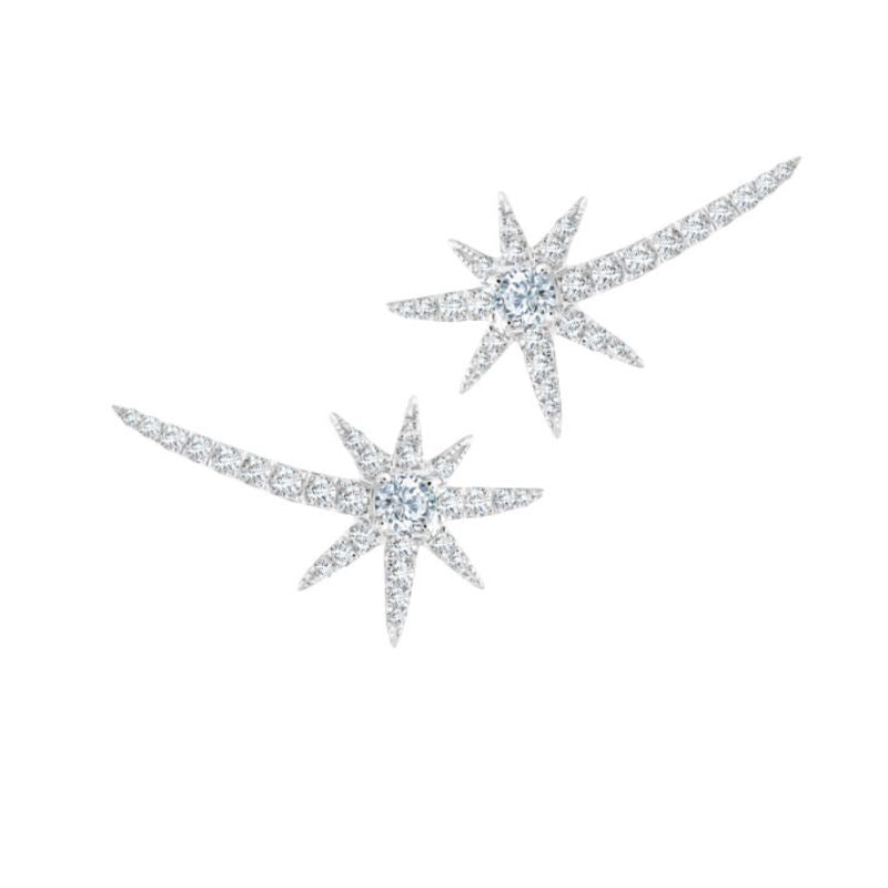 These starburst earrings are stunning! The long tail of the starburst travels up the wearers ear creating an ear cuff look. These earrings have also been spotted on Taylor Swift! There are 0.45 carat total weight of I-J color white diamonds set in 18K white gold. 