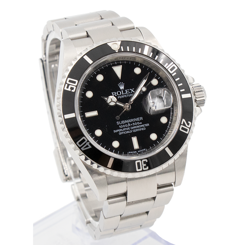 This Submariner features a 40mm stainless steel bezel, case & bracelet. Its powered by Rolexs 3135 automatic date movement which allows this watch to have a 2-day power reserve. The watch came to our store as a trade and is in excellent condition. Box and papers are available. Please contact us if you have any questions about this watch.
