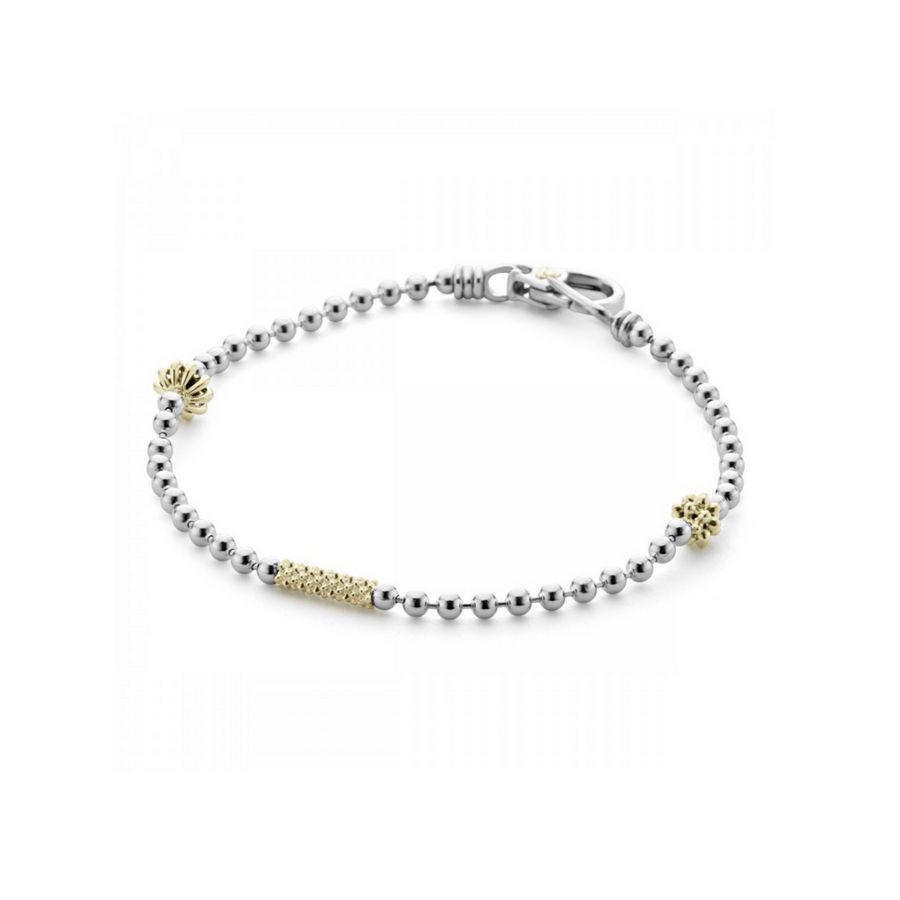 Sterling silver bracelet with 18K gold Caviar beading and fluted accents. Ideal to style various bracelets for a unique look. Finished with a signature lobster clasp.- Sterling Silver & 18K Gold- Signature Lobster Clasp- 1 Strand 2.5mm Ball Chain- STYLE #: 05-81082-7
