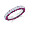 This 18K white gold band is not your average diamond band! From the top, 1.80 carat total weight G-H color white diamonds sparkle brilliantly. On the sides, the wearer gets the view of 2.24 carat total weight ruby. 