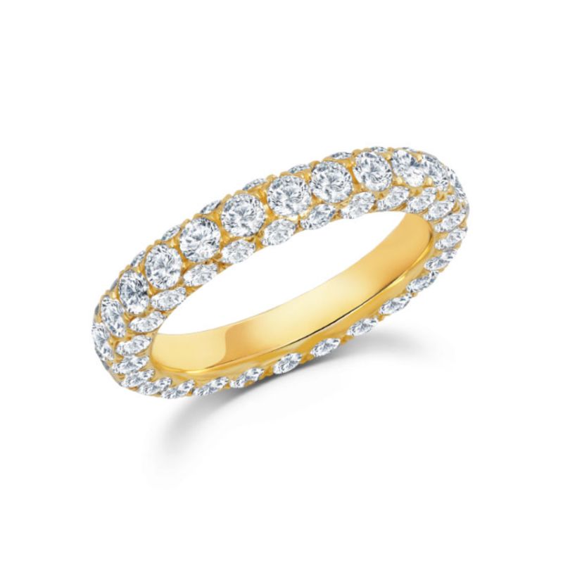 This 18K yellow gold band is not your average diamond band! From all three sides, the wearer gets to see 4.00 carat total weight of G-H color white diamonds sparkling all the way around the band. 
