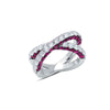 This 18K white gold x ring has 2.98 carat total weight rubies and 1.83 carat total weight G-H color white diamonds. White diamonds sparkle from the front of the ring, and on the side profiles of the ring, rubies accent the diamonds. 